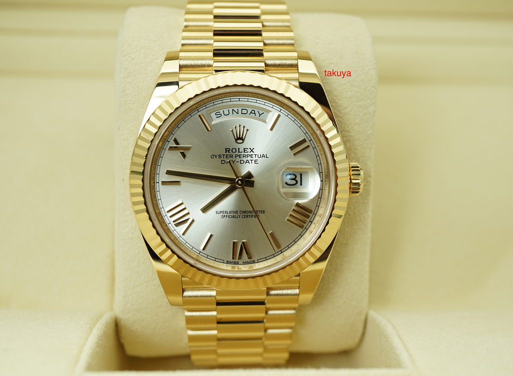 rolex day date gold silver