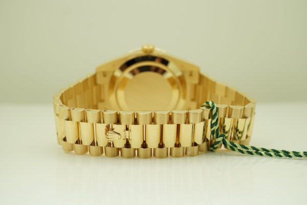 BRAND NEW Rolex 228348RBR DAY DATE 40 YELLOW GOLD DIAMOND BEZEL BAGUETTE DIAL 2021 FULL SET - Image 7