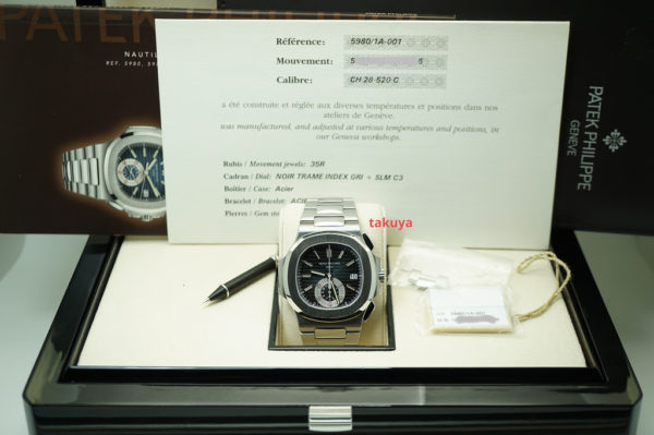 Patek PHILIPPE NAUTILUS 5980 CHRONOGRAPH STAINLESS STEEL BLUE DIAL COMPLETE SET - Image 2