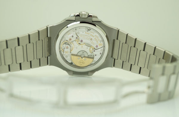 Patek PHILIPPE 5712 STAINLESS STEEL NAUTILUS BLUE DIAL MOONPHASE 2018 COMPLETE SET - Image 9