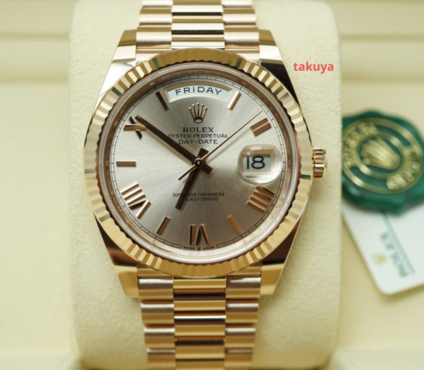 BRAND NEW Rolex 228235 DAY DATE 40 18K ROSE GOLD SUNDUST ROMAN DIAL 2021 COMPLETE SET