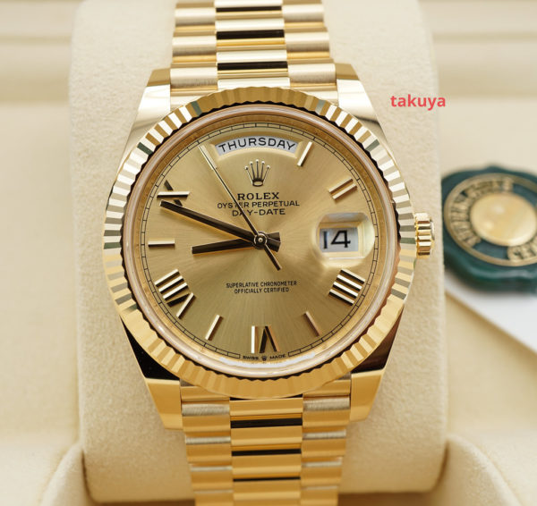 BRAND NEW Rolex 228238 DAY DATE 40 YELLOW GOLD CHAMPAGNE ROMAN DIAL 2022 FULL SET