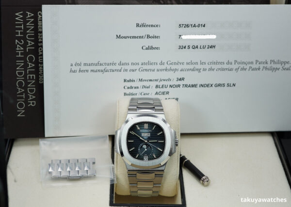 Patek PHILIPPE 5726/1A NAUTILUS ANNUAL CALENDAR MOONPHASE BLUE DIAL FULL SET - Image 2
