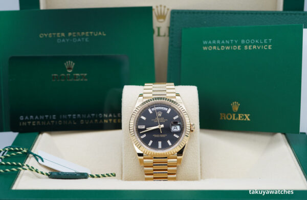 Rolex 228238 DAY DATE 40 YELLOW GOLD BLACK BAGUETTE DIAMOND DIAL 2023 FULL SET - Image 2