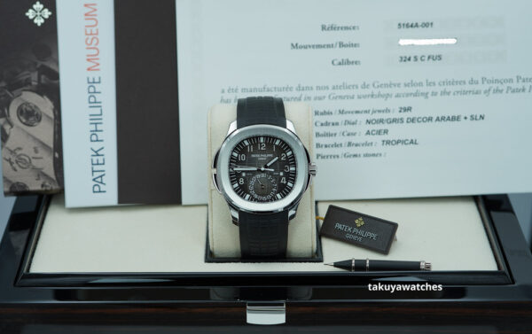 Patek PHILIPPE 5164A AQUANAUT TRAVEL TIME STAINLESS STEEL 2021 COMPLETE SET - Image 2