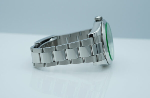 Rolex 116400GV MILGAUSS GREEN CRYSTAL BLACK DIAL 2021 WARRANTY FULL SET - Image 6
