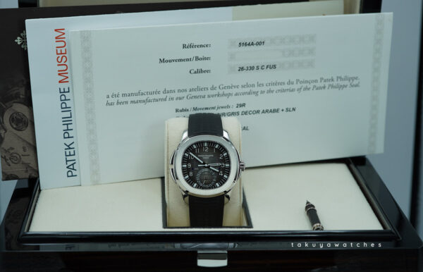 Patek PHILIPPE 5164A AQUANAUT TRAVEL TIME STAINLESS STEEL 2022 FULL SET - Image 2