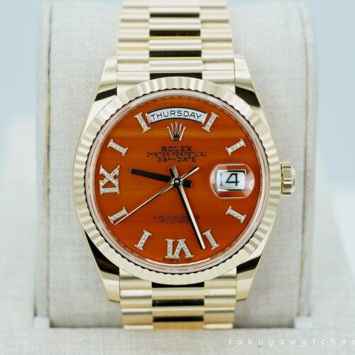 Rolex 128238 DAY DATE 36 YELLOW GOLD CARNELIAN DIAL 2024 WARRANTY FULL SET